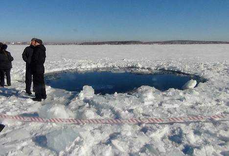 &lt;p&gt;A circular hole in the ice of Chebarkul Lake where a meteor reportedly struck the lake near Chelyabinsk, about 930 miles east of Moscow, Russia, Friday. A meteor streaked across the sky and exploded over Russia's Ural Mountains with the power of an atomic bomb Friday, its sonic blasts shattering countless windows and injuring nearly 1,000 people.&lt;/p&gt;