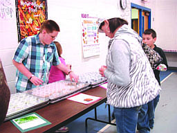 Kade Parkin serves samples at the taste-testing station.