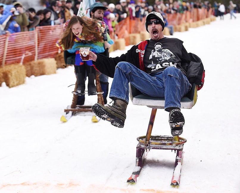 &lt;p&gt;Gary Wallette yells as he crosses the finish line ahead of Jamie Dawson and Tyler McRae during the Cabin Fever Days Barstool Races in Martin City on Saturday. (Aaric Bryan/Daily Inter Lake)&lt;/p&gt;