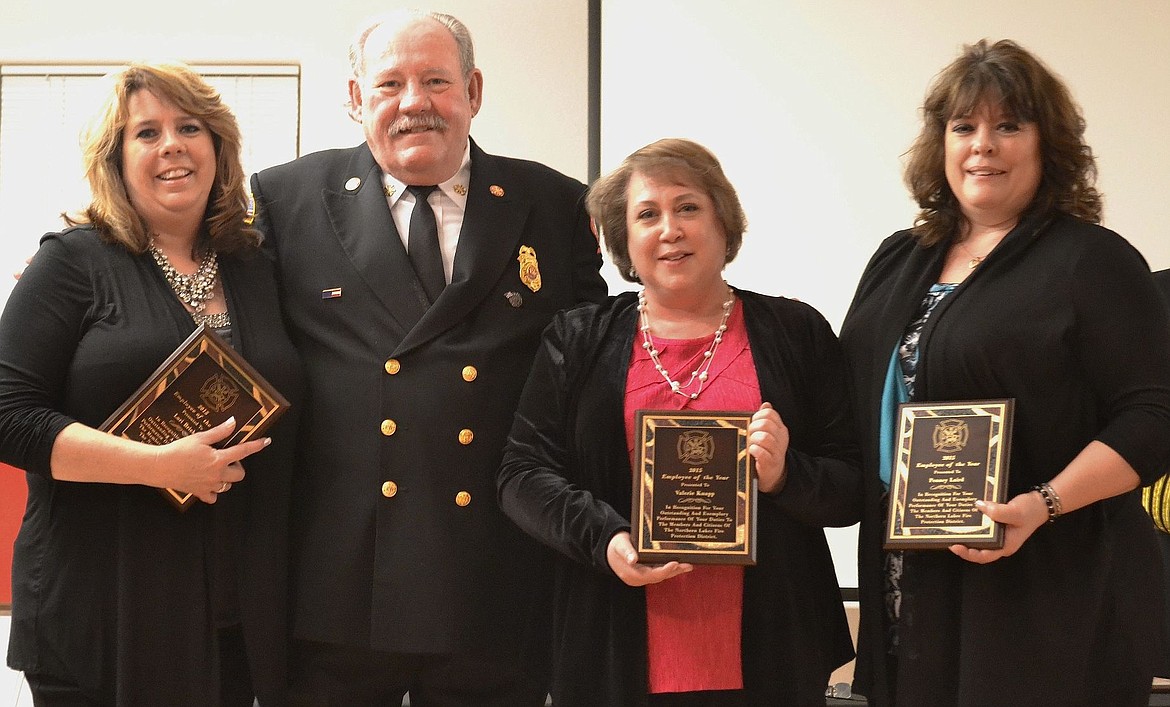 &lt;p&gt;Northern Lakes Fire District Employees of the Year include Lori Brickey, far left, Valerie Knapp, pictured to the right of former Chief Dean Marcus and Penny Laird.&lt;/p&gt;