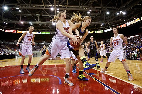 &lt;p&gt;Coeur d'Alene High's Madison Sumner, right, battles Hallie Gennett from Post Falls High for a rebound Saturday during the first half of the Idaho 5A State championship game at the Idaho Center in Nampa.&lt;/p&gt;