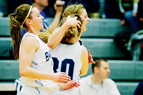 &lt;p&gt;Abby Skeen, right, from Bonners Ferry High, rushes the court to celebrate with Jailee Foster, center and McKenzie MacDonald and the rest of their team after winning the state 3A consolation game Saturday against Marsh Valley High.&lt;/p&gt;