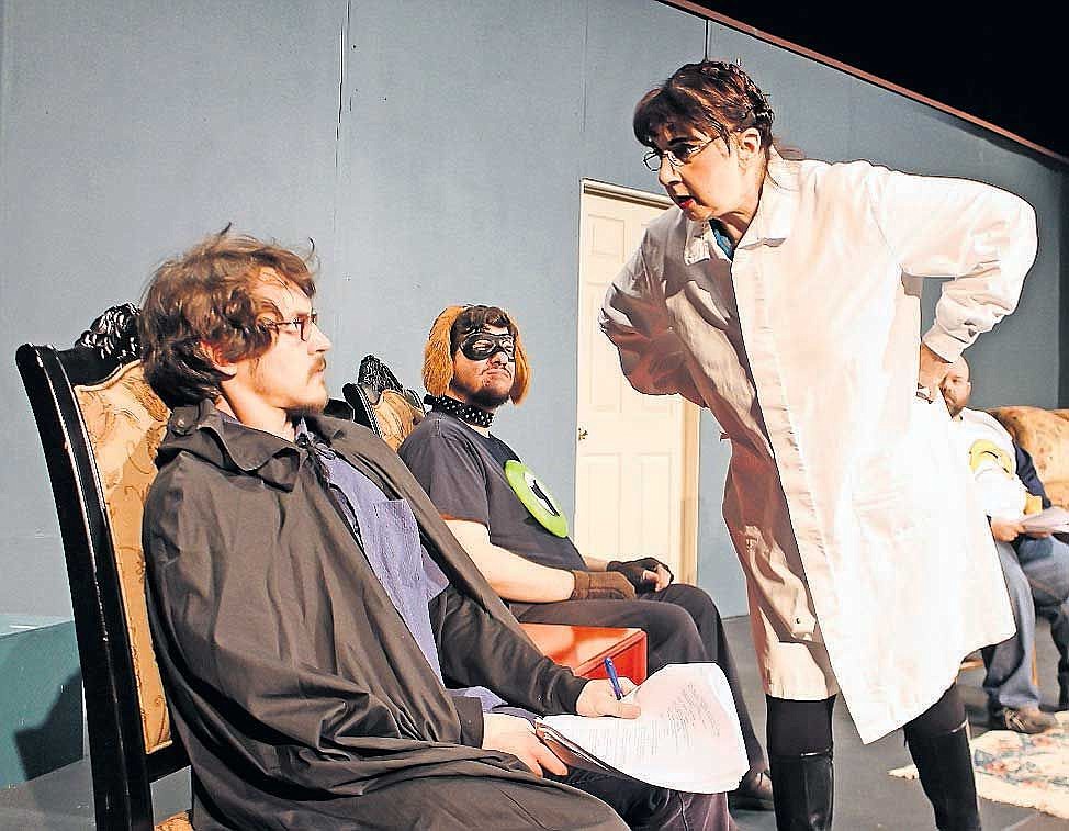 Standing in for an absent cast member, Jeff Ames (left) gets an earful during Masquers Theater company rehearsal. The world premiere of his one-act play 'A Window Ajar&quot;&#160;is part of the 'Them Three,&quot; the company's current production.