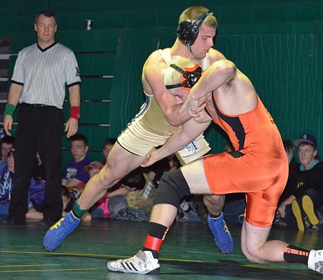 &lt;p&gt;Priest River's Brian Fink shoots on Timberlake's Forrest Herring during the 170-pound finals match at the 3A District I wrestling championships.&lt;/p&gt;