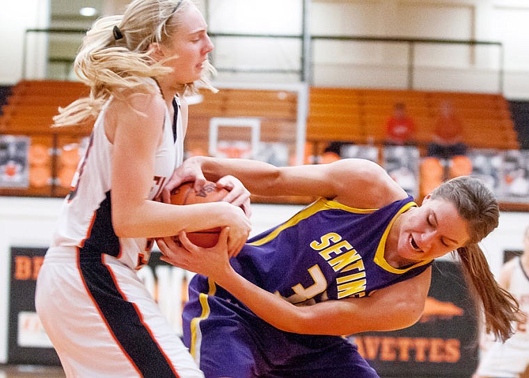 &lt;p&gt;Flathead freshman guard Tiana Johnson (left) fights for a rebound with Missoula Sentinel senior forward Olivia Roberts Friday night during Flathead's home loss to Missoula Sentinel. Feb. 14, 2014 in Kalispell, Montana. (Patrick Cote/Daily Inter Lake)&lt;/p&gt;