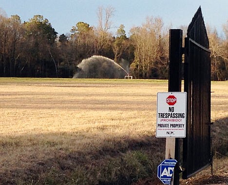 &lt;p&gt;In this Jan. 29 photo, a sprayer soaks a field with liquefied manure and urine from a large-scale hog farm in Duplin County, N.C.&#160;&lt;/p&gt;