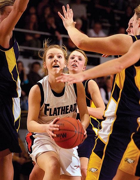 Flathead senior Chaeney Latimer drives to the basket during Friday&#146;s game against Missoula Big Sky. Flathead won, 59-52. Latimer co-led all Flathead scorers with 14 points. Jennifer DeMonte/Daily Inter Lake