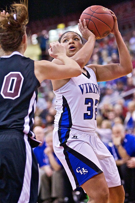 <p>Kendalyn Brainard from Coeur d'Alene High spins toward the basket after receiving a pass during the second half.</p>