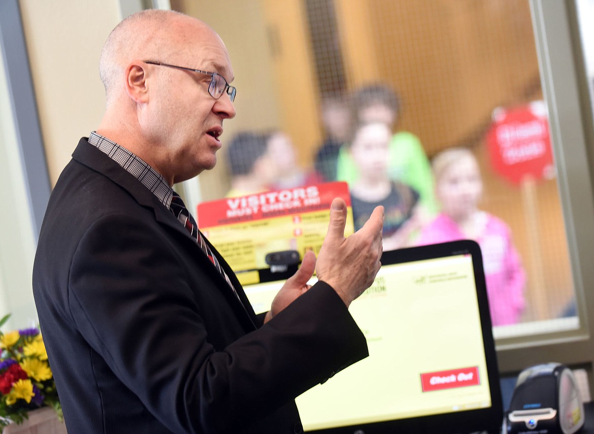 &lt;p&gt;Flathead County Superintendent Mark Flatau discusses the installation and use of the new identification system from Complete Campus Security Solutions at Edgerton Elementary on Tuesday morning, February 9, in Kalispell. (Brenda Ahearn/Daily Inter Lake)&lt;/p&gt;