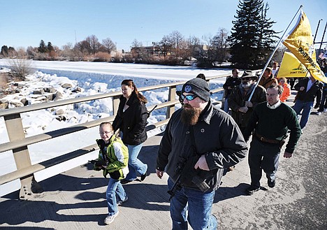 &lt;p&gt;Nick Free, front, leads the Save Our Second Amendment March with his daughter Madison, left, and his wife Teisha, center, Saturday in Idaho Falls.&lt;/p&gt;