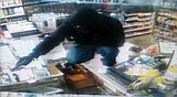 Armed robbery suspects remain at large