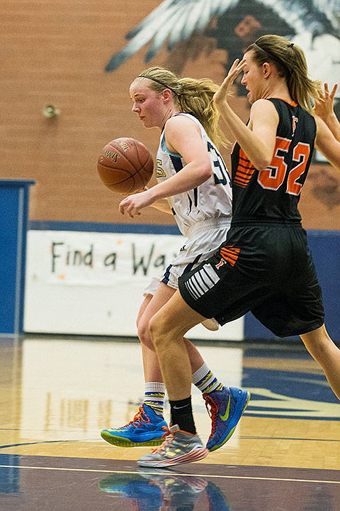 &lt;p&gt;Timberlake&#146;s Keelie Lawler dribbles around Fruitland defender Brooke Teunissen in the second half.&lt;/p&gt;