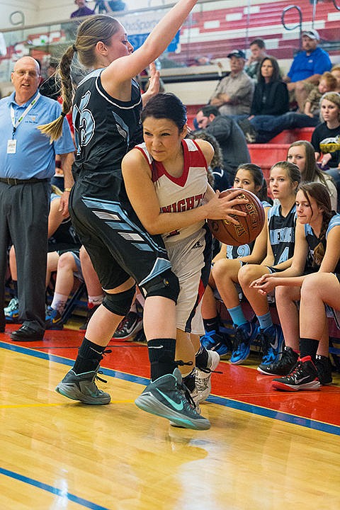 &lt;p&gt;Lakeside High School&#146;s Jordyn Nomee fights for space before passing the ball while being guarded by Dietrich High&#146;s Addie Robertson in the second quarter.&lt;/p&gt;