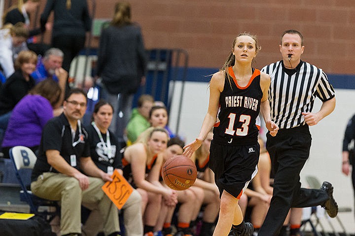 &lt;p&gt;Priest River guard Avery Summers takes the ball up the court against Filer High School during the Idaho state 3A girls basketball tournament on Thursday in Nampa.&lt;/p&gt;