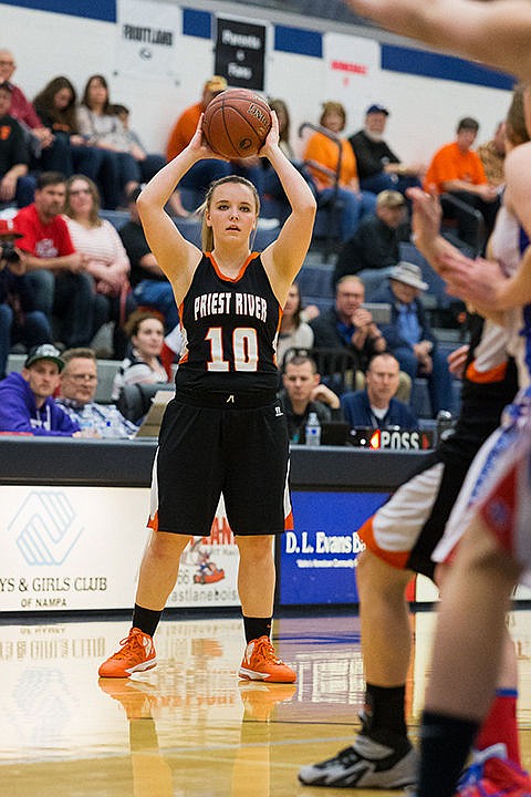 &lt;p&gt;Priest River&#146;s Lily Luckey looks to pass in the first quarter.&lt;/p&gt;