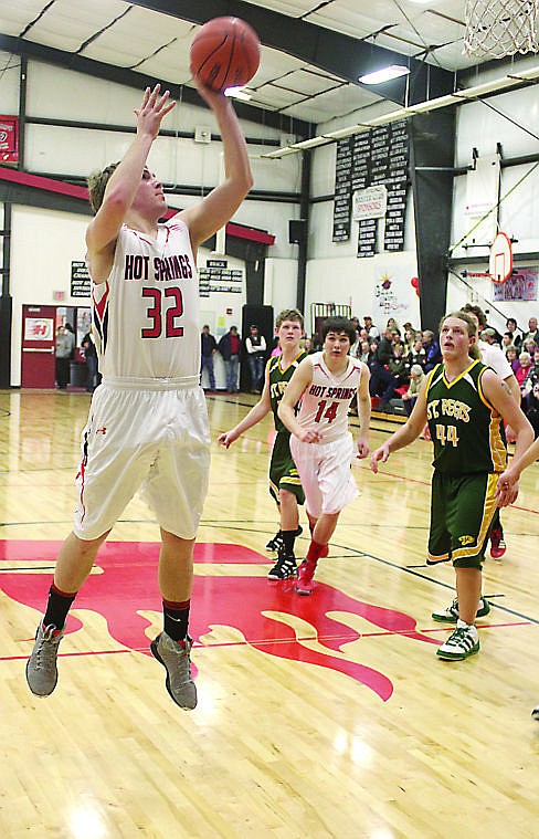 &lt;p&gt;Hot Springs Savage Heat player Nate Gray takes a shot in the Tuesday night game against the St. Regis Tigers.&lt;/p&gt;