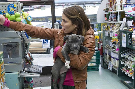 &lt;p&gt;This undated photo provided by Twentieth Century Fox, shows actress Noomi Rapace as &quot;Nadia&quot; holding Rocco, a puppy Pit Bull in the film &quot;The Drop&quot; staring the late James Gandolfini.&lt;/p&gt;