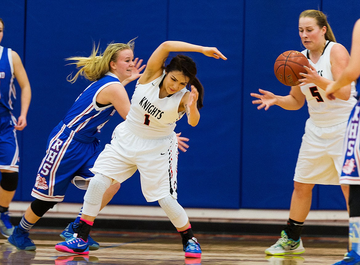 &lt;p&gt;SHAWN GUST/Press Lakeside High School&#146;s Lillian Rhea (5) reacts to the ball after Jordyn Nomee (1) strips it from Rockland High&#146;s Kariena Turnbeaugh Thursday at the state 1A Division II girls basketball tournament at Nampa High School.&lt;/p&gt;