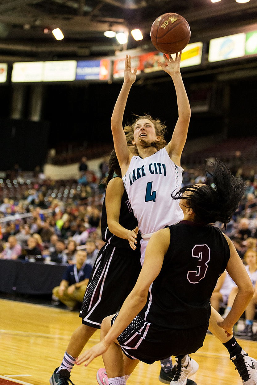 &lt;p&gt;SHAWN GUST/Press Lake City&#146;s Kate Maryon goes up for a shot between a pair of Centennial defenders in the second half.&lt;/p&gt;