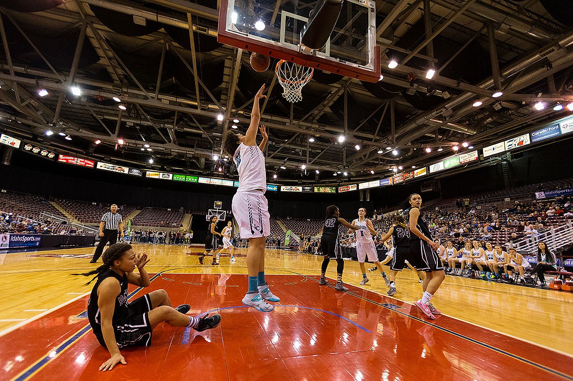 &lt;p&gt;SHAWN GUST/Press Whitney Meier puts up a third quarter score for Lake City.&lt;/p&gt;