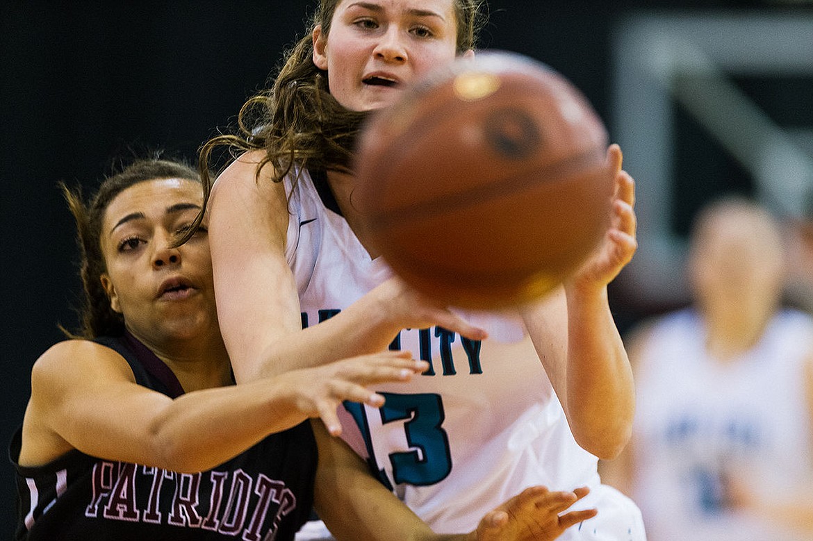 &lt;p&gt;SHAWN GUST/Press Lake City High School&#146;s Olivia Maryon (13) and Centennial High&#146;s Ayana Amaechi collide as the ball gets flies out of bounds during the first quarter of the state 5A girls basketball tournament Thursday at the Idaho Center in Nampa.&lt;/p&gt;