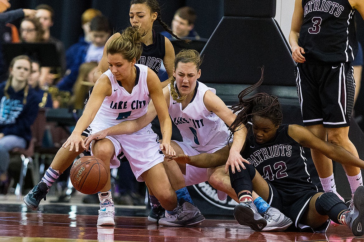 &lt;p&gt;SHAWN GUST/Press Lake City&#146;s Cierra Dvorak, far left, gets the best position on a scramble for the ball as teammate Bridget Rieken (5) and Centennial defender Dominique Williams fall to the floor during the second quarter.&lt;/p&gt;