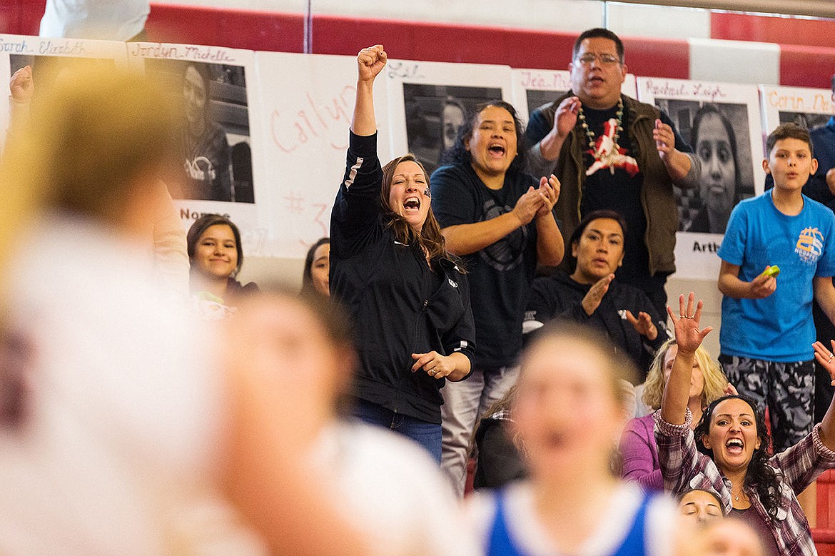 &lt;p&gt;SHAWN GUST/Press Christine Hodgson shakes her fist in the air after a score by the Lakeside High School girls basketball team.&lt;/p&gt;