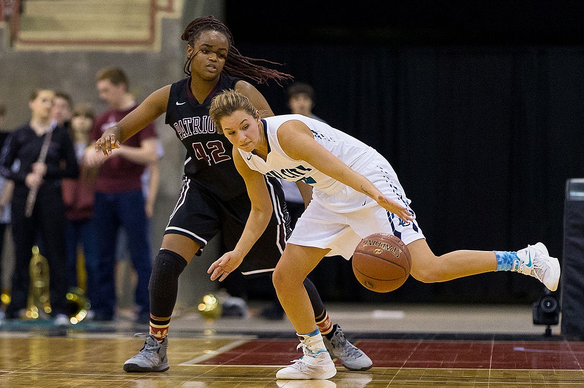 &lt;p&gt;SHAWN GUST/Press The Timberwolves&#146; Nina Carlson reaches our for the ball after stealing it from Centennial&#146;s Dominique Williams.&lt;/p&gt;