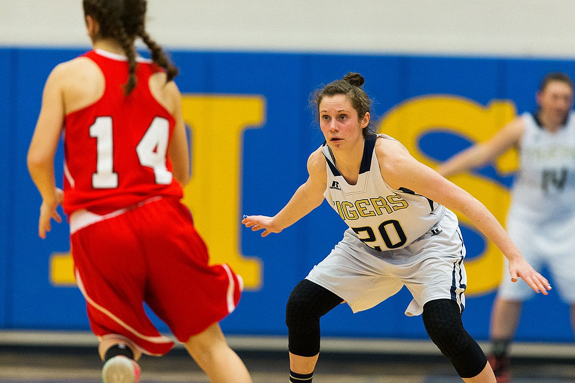 &lt;p&gt;SHAWN GUST/Press Timberlake High&#146;s Allison Kirby (20) defends Homedale&#146;s Kendall Nash (14).&lt;/p&gt;