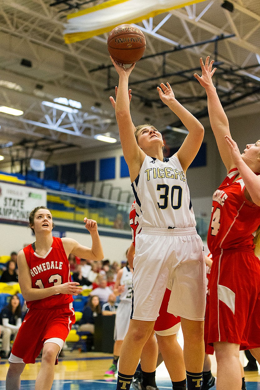 &lt;p&gt;SHAWN GUST/Press Timberlake&#146;s Carleen Simpson shoots a basket in the second half against Homedale.&lt;/p&gt;