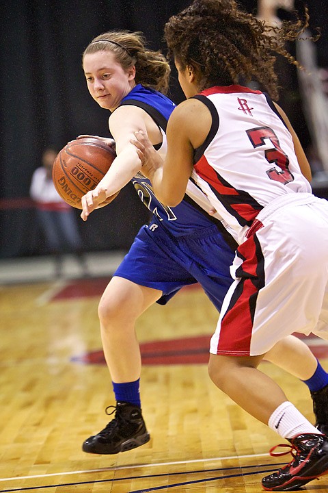 &lt;p&gt;Coeur d'Alene High's Erin Legel attempts to sweep past Timberly Bowie from Highland.&lt;/p&gt;