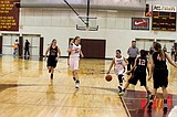 Moses Lake girls take one of two games