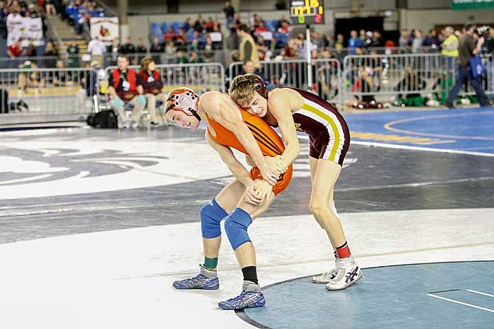 Trey Long tries to keep Lake Steven's AJ Crew from escaping for a point in their second round match up. Long was the only Moses Lake wrestler to make it to the finals.