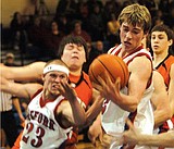 Scott Taylor leads conference, breaks school record in rebounds