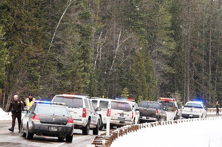 &lt;p&gt;Officers with the Glacier County Sheriff's Office, Bureau of Indian Affairs, Montana Highway Patrol and Flathead County Sheriff's Office block U.S. 2 outside West Glacier after the conclusion of a high-speed chase that started in Glacier County on Wednesday. (Patrick Cote/Daily Inter Lake)&lt;/p&gt;