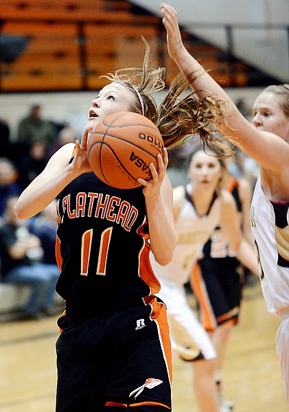 &lt;p&gt;Flathead senior Dani Davis (11) shoots for two during the game against Helena High on Saturday, February 16, in Kalispell. (Brenda Ahearn/Daily Inter Lake)&lt;/p&gt;