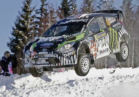 &lt;p&gt;U.S. driver Ken Block and co-driver Alex Gelsomino drive their Ford Fiesta RS during the 11th special stage of the WRC Rally Sweden 2011 in Hagfors, Sweden, on Feb. 12. The Detroit automaker announced a partnership with Russian automaker Sollers on Friday.&lt;/p&gt;