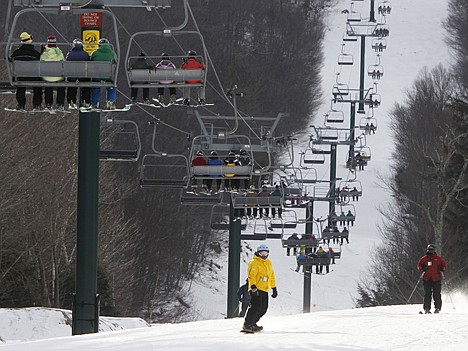 &lt;p&gt;Skiers ride a lift at the Sugarbush ski resort on Feb. 14, in Warren, Vt.&lt;/p&gt;