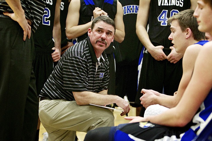 &lt;p&gt;JEROME A. POLLOS/Press Coeur d'Alene High head coach Darren Taylor discuss his team's game plan during a timeout in the second half.&lt;/p&gt;