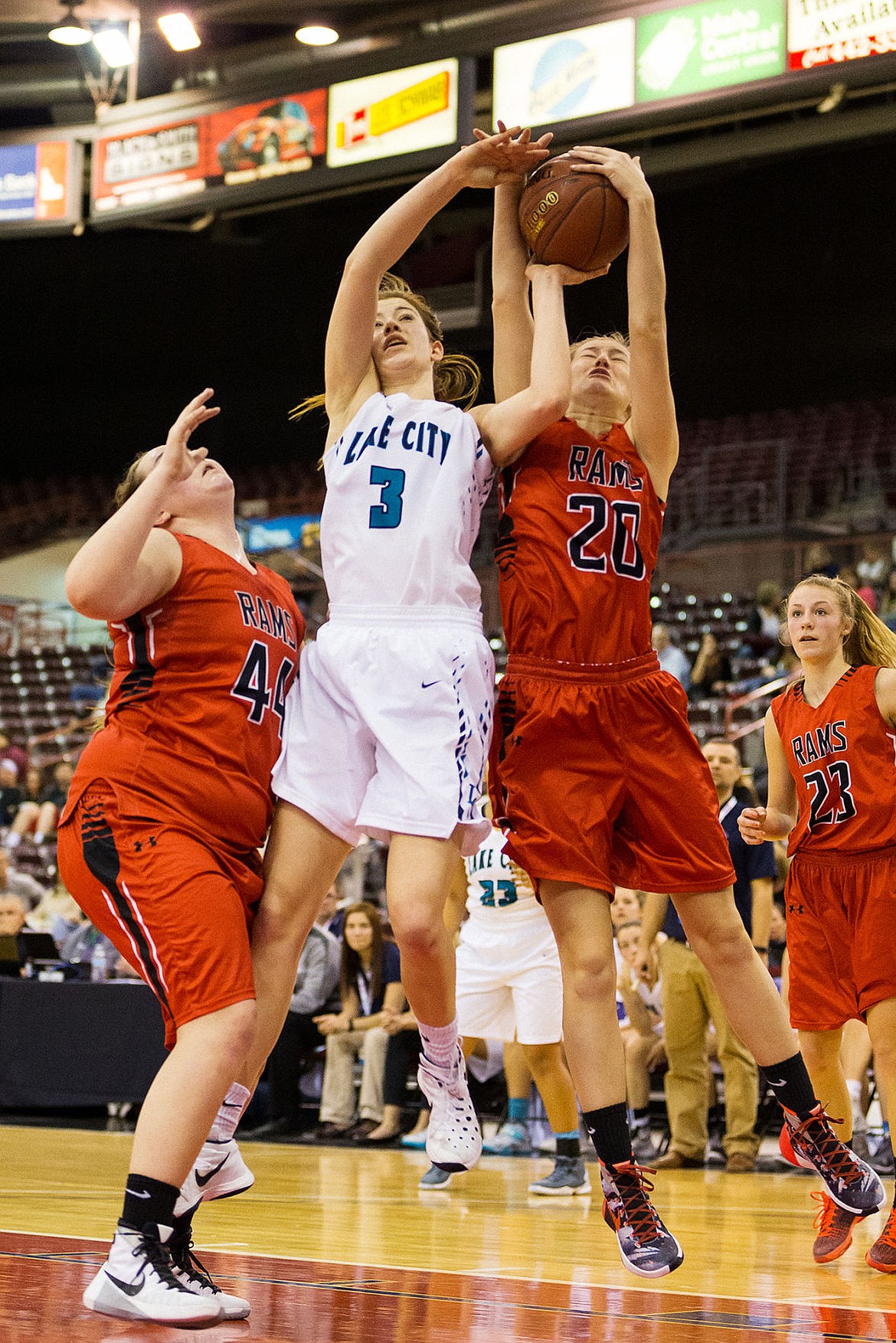 &lt;p&gt;SHAWN GUST/Press Lake City&#146;s Nina Carlson (3) is fouled by Highland&#146;s Madison McQuivey during the third quarter.&lt;/p&gt;