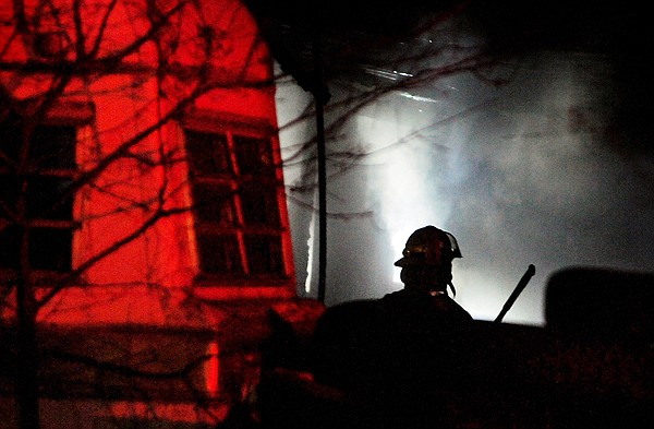 &lt;p&gt;A firefighter stands silhouetted against the smoke of a fire on
Tuesday evening in Kila. Crews from three stations were called to
help get the blaze under control.&lt;/p&gt;