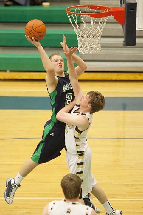 &lt;p&gt;Glacier&#146;s Sean Peters (left) shoots over a Bruins&#146; defender
during Glacier&#146;s victory over Helena Capital Saturday afternoon at
Glacier High School.&lt;/p&gt;