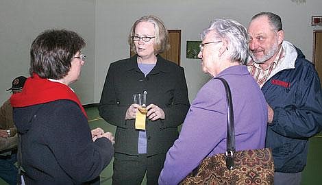 Photo by Nick Ianniello&lt;br&gt;St. Regis' new superintendent, Patty Kero (center), talks with St. Regis parent, Lisa Green (left), and Sandy Winegar (right) at a community reception for superintendent applicants Wednesday at St. Regis High School. Kero was chosen from five other applicants after a closed meeting Wednesday night.