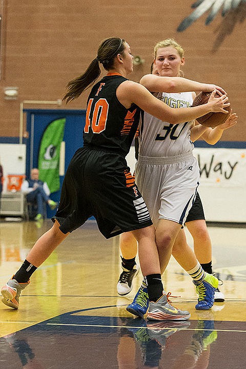 &lt;p&gt;Timberlake&#146;s Carleen Simpson fights for possession of the ball from Fruitland&#146;s MaKenna Little.&lt;/p&gt;