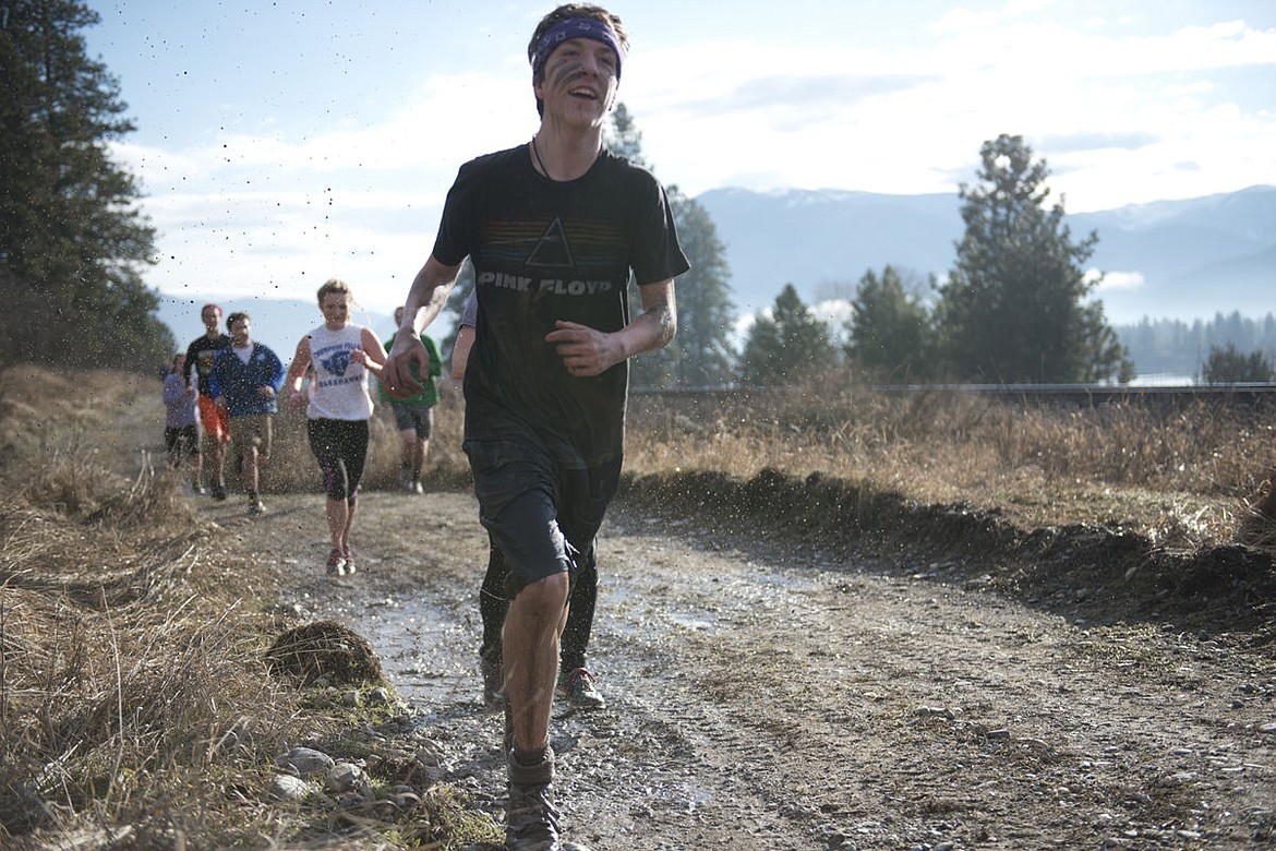 &lt;p&gt;Kris Nagel runs through the mud at the Clark Fork Valley Mud Run last Saturday.&lt;/p&gt;