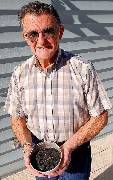 Wayne Herman, one of the founding members of the Flathead Coalition, shows a sample of coal he collected from an open seam at the Cabin Creek mining site in 1975. That mine proposal stirred up a grass-roots resistance that has persisted ever since to protect Montana&#146;s water quality, fisheries and wildlife.