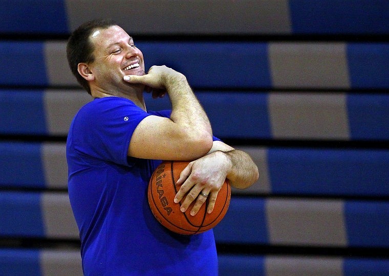 Coach La Mott laughs during a recent practice