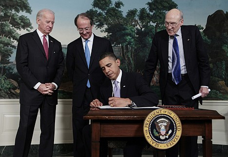 &lt;p&gt;President Barack Obama signs an executive order creating the bipartisan National Commission on Fiscal Responsibility and Reform, Thursday, Feb. 18, 2010, in the Diplomatic Reception Room of the White House in Washington, Thursday, Feb. 18, 2010. From left are, Vice President Joe Biden, and the co-chairs, Erskine Bowles and Alan Simpson. (AP Photo/Charles Dharapak)&lt;/p&gt;