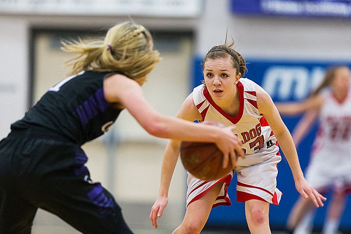 &lt;p&gt;Sandpoint High&#146;s Riley Couch defends a Century player during the fourth quarter.&lt;/p&gt;