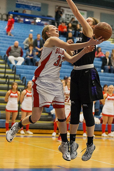 &lt;p&gt;Sandpoint&#146;s Grace Kirscher is fouled by Century&#146;s Alyssa Walker while putting up a shot during the fourth quarter.&lt;/p&gt;